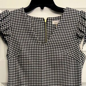 Calvin Klein Black and White Checkered Dress with puffed shoulder sleeves.